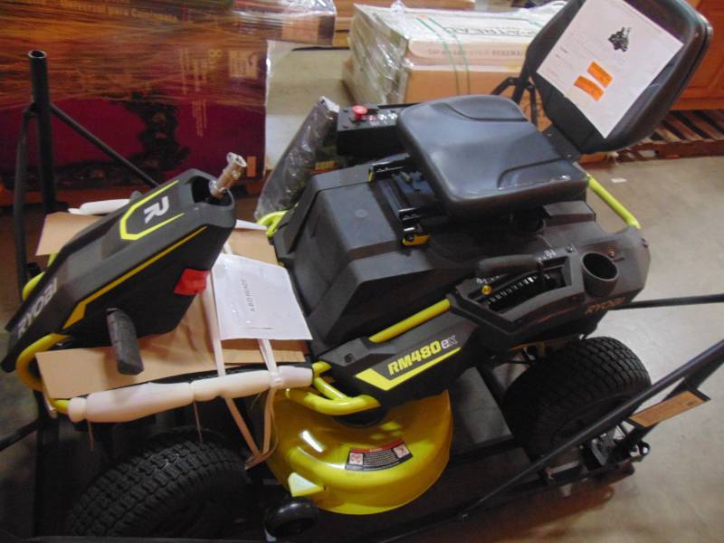 lot 509 image: Ryobi 38 in. 100 Ah Battery Electric Rear Engine Riding Lawn Mower RY48111 - Missing Steering Wheel and Charger.