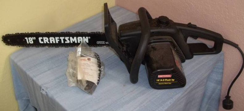 lot 57 image: Electric Chainsaw