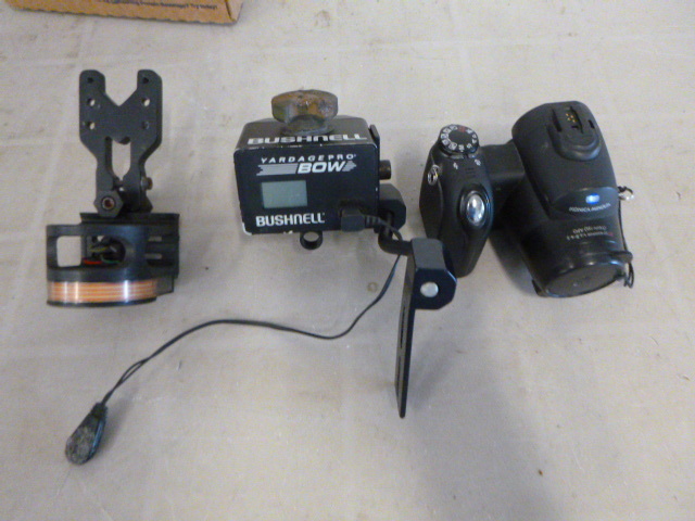 lot 19 image: Bushnell Yardage Pro Bow Archery Range Finder and Konica Minolta Camera