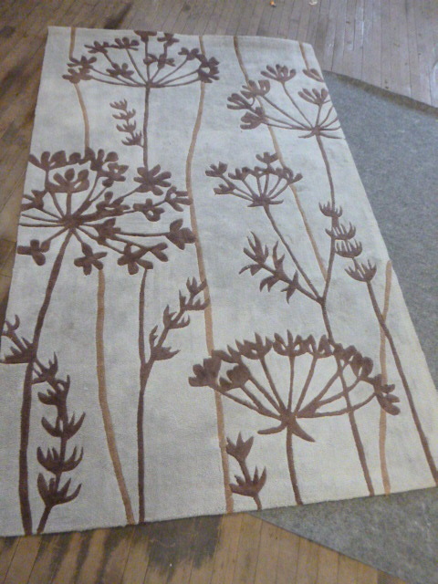 lot 12 image: Surya Area Rug