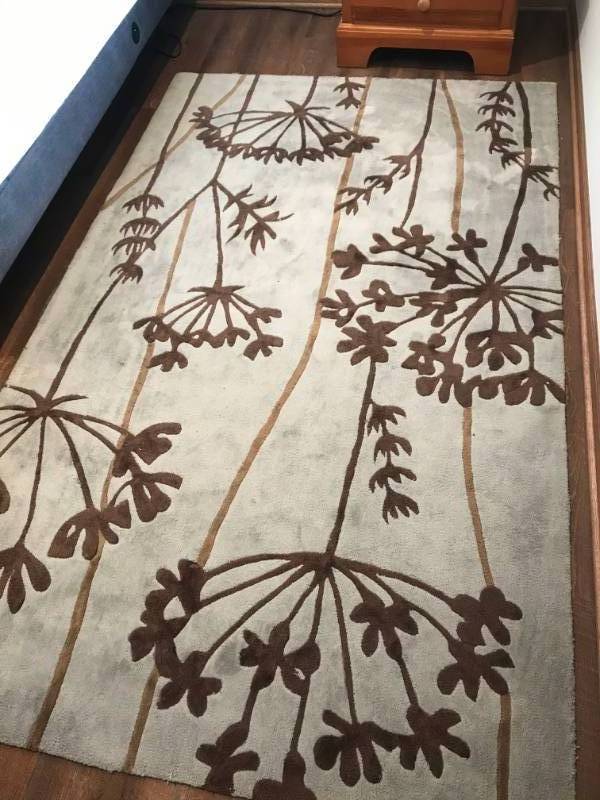 lot 11 image: Surya Area Rug