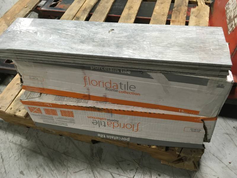 Florida Tile Home Collection Wind River Grey 6 in. x 24 in. Porcelain Floor and Wall Tile (14 sq. ft.  case)- good condition