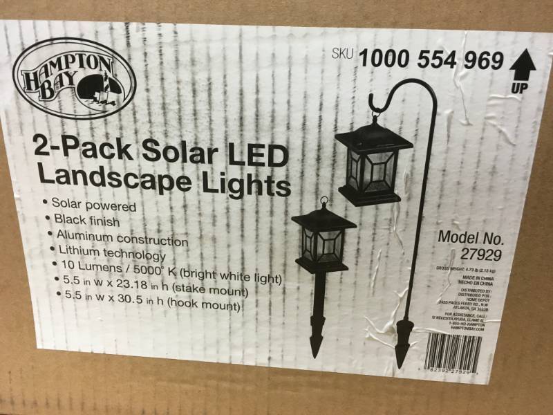 lot 37 image: Hampton Bay Solar Black Outdoor Integrated LED Diamond Shepard Hook Lantern Landscape Path Light (2-Pack)- not used