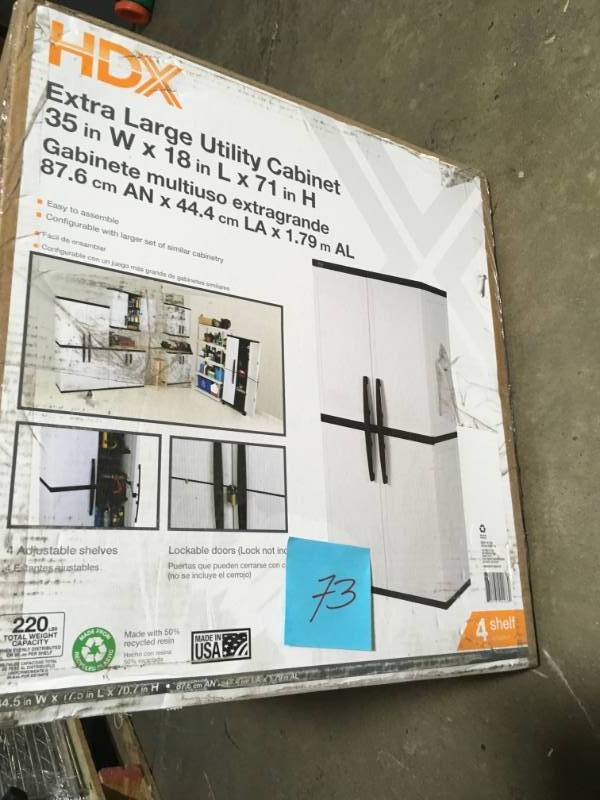 lot 73 image: HDX 35 in. W 4 Shelf Plastic Multi-Purpose Cabinet in Gray- not used