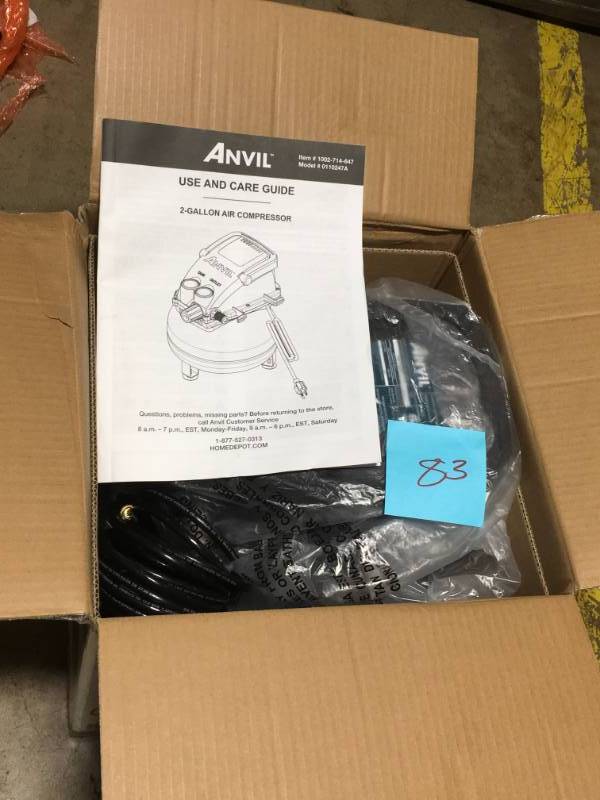 lot 83 image: ANVIL 2G Pancake Air Compressor with 7-Piece Accessories Kit- open box