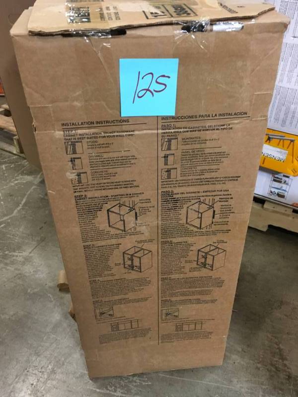 lot 125 image: Hampton Bay Hampton Assembled 30x12x12 in. Wall Bridge Kitchen Cabinet in Natural Hickory- not used