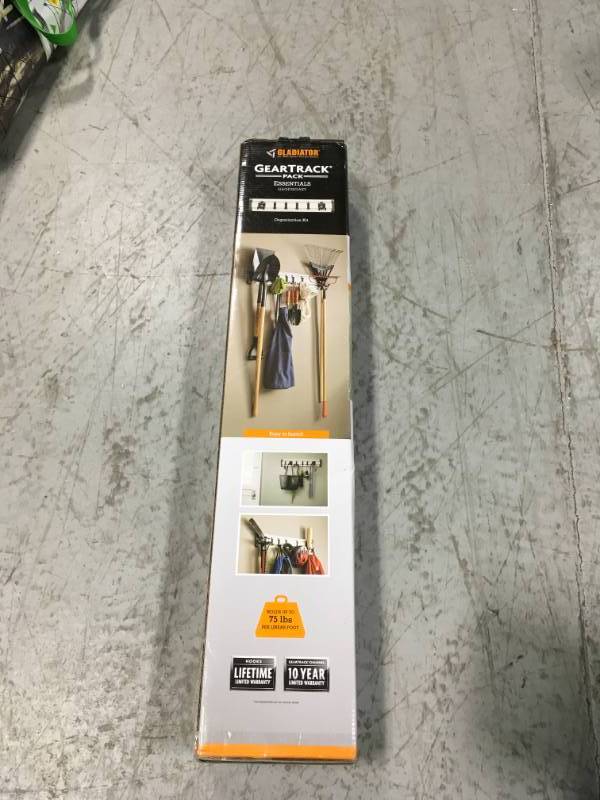 lot 31 image: Gladiator GAGP32GAEY 32 in. L GearTrack Garage Wall Storage Kit with 6-Hooks- not used