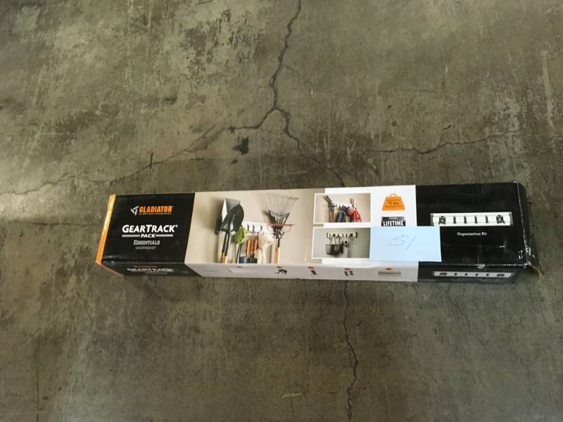 lot 51 image: Gladiator 32 in. L GearTrack Garage Track Storage System with 6-Hooks- not used