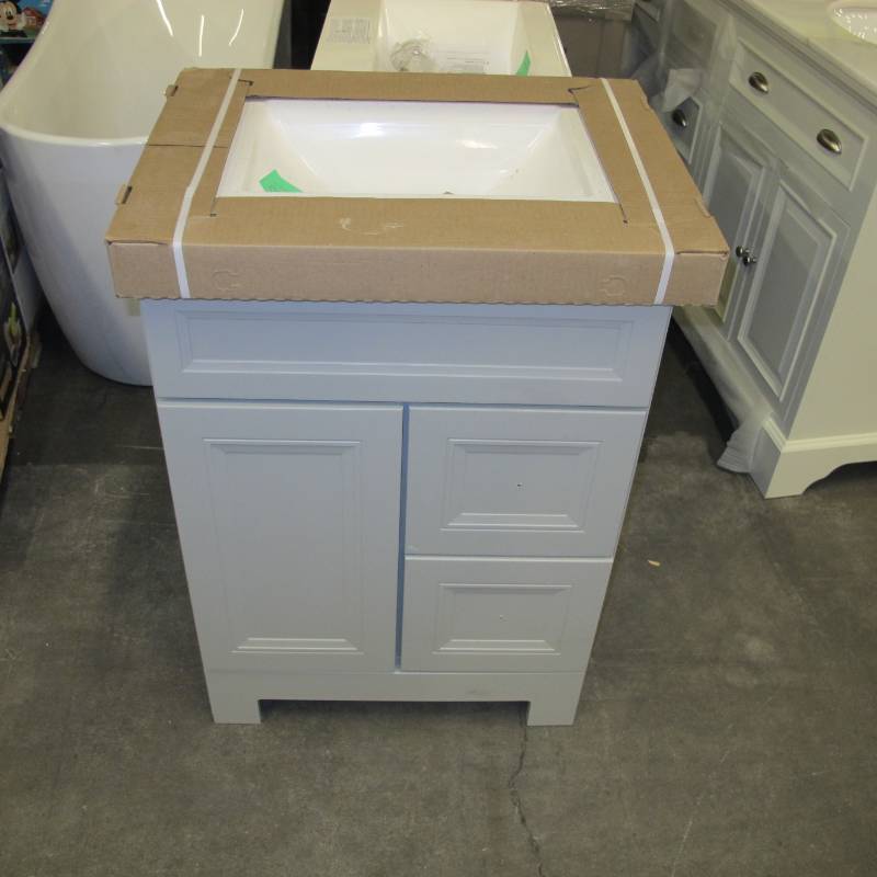 lot 31 image: Home Decorators Collection Sedgewood 24-12 in. W Bath Vanity in White with Solid Surface Technology Vanity Top in Arctic with White Sink