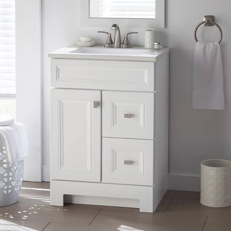 lot 51 image: Home Decorators Collection Sedgewood 24-12 in. W Bath Vanity in White with Solid Surface Technology Vanity Top in Arctic with White Sink