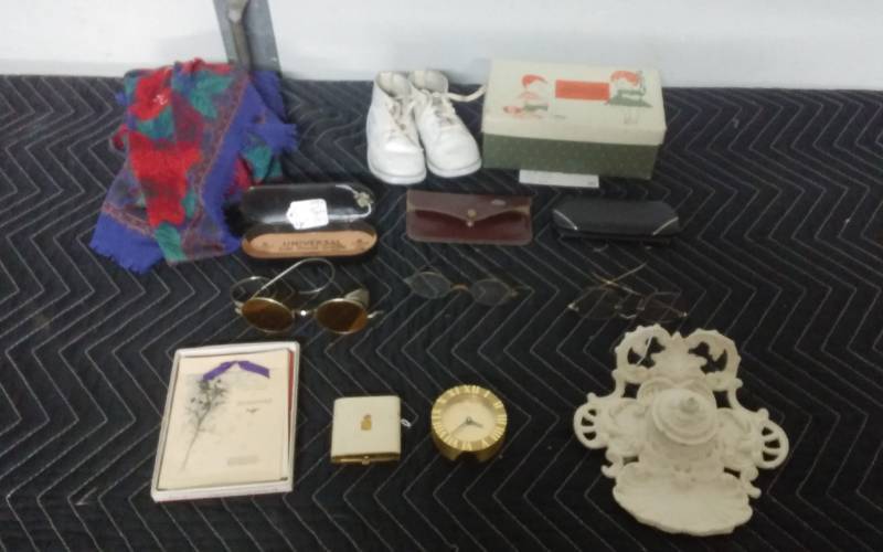 lot 27 image: Old Eye Glasses With Case, Baby Shoes, Solid Brass Tiffany Clock, Cast Iron Art Nouveau Ink Well