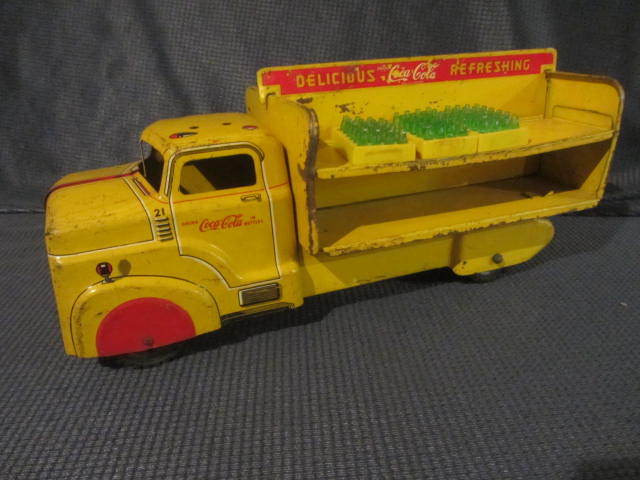lot 12 image: Marx Coca Cola Truck, Bottles