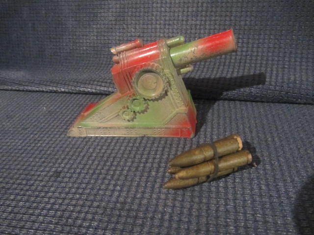 lot 20 image: Cast Launcher, Wooden Missiles