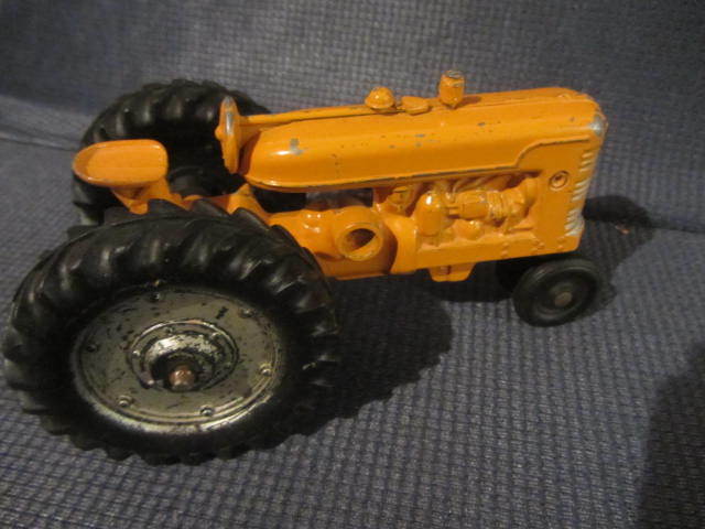 lot 27 image: Slik Toy Tractor