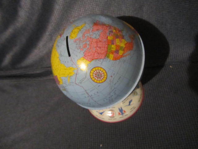 lot 30 image: Tin Globe Bank
