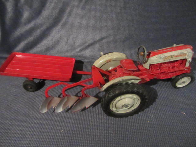 lot 53 image: Ford Tractor, Mounted Plow, Trailer