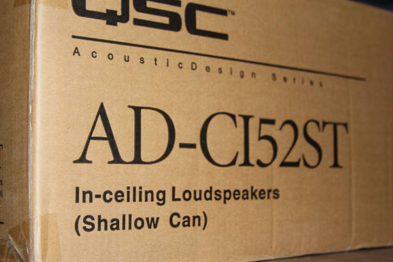 lot 32 image: New in Box  Pair of QSC Acoustic Design Wide Bandwidth High Fidelity Ceiling Speakers