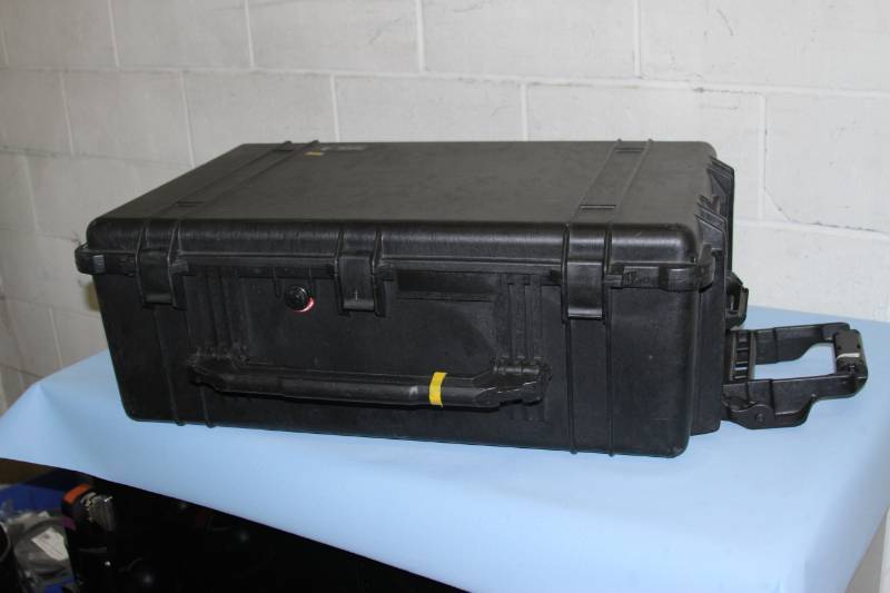 lot 17 image: Pelican 1650 Watertight Crushproof Dustproof Portable Hard-Sided Travel  Storage Case with Telescoping Handle