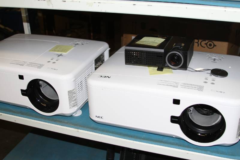 lot 85 image: Lot of Miscellaneous Pro Audiovisual Projectors Audio Monitors Wireless Headphones & More - PARTS  REPAIR