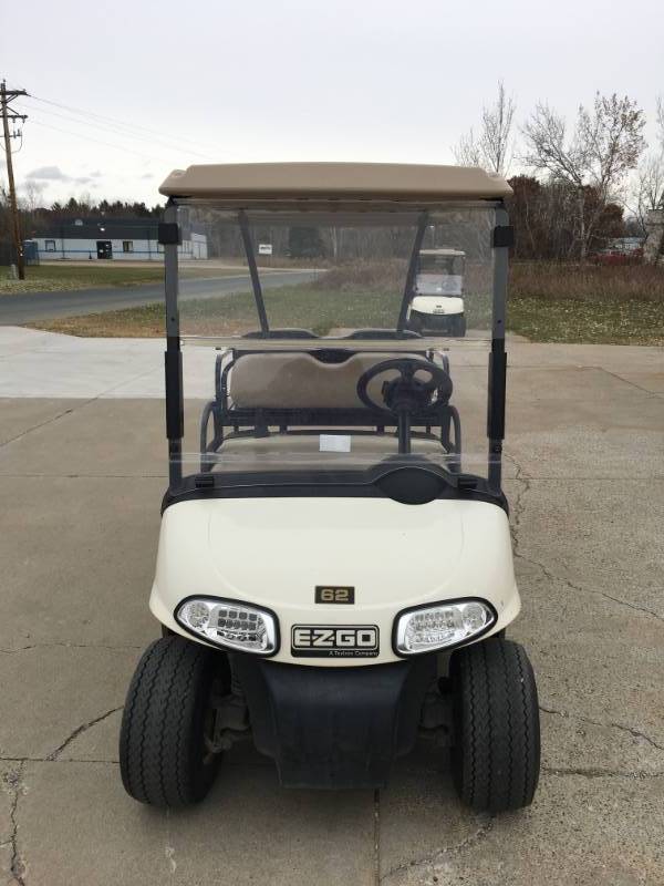 2013 EZGO RXV GOLF CART -  2016 BATTERIES - TESTED WELL - REAR FLIP SEAT - LED LIGHTS - FACTORY CHARGER - WINDSHIELD - STATE OF CHARGE METER  -   SERIAL NUMBER 5188868    RUNS AND DRIVES PERFECT -