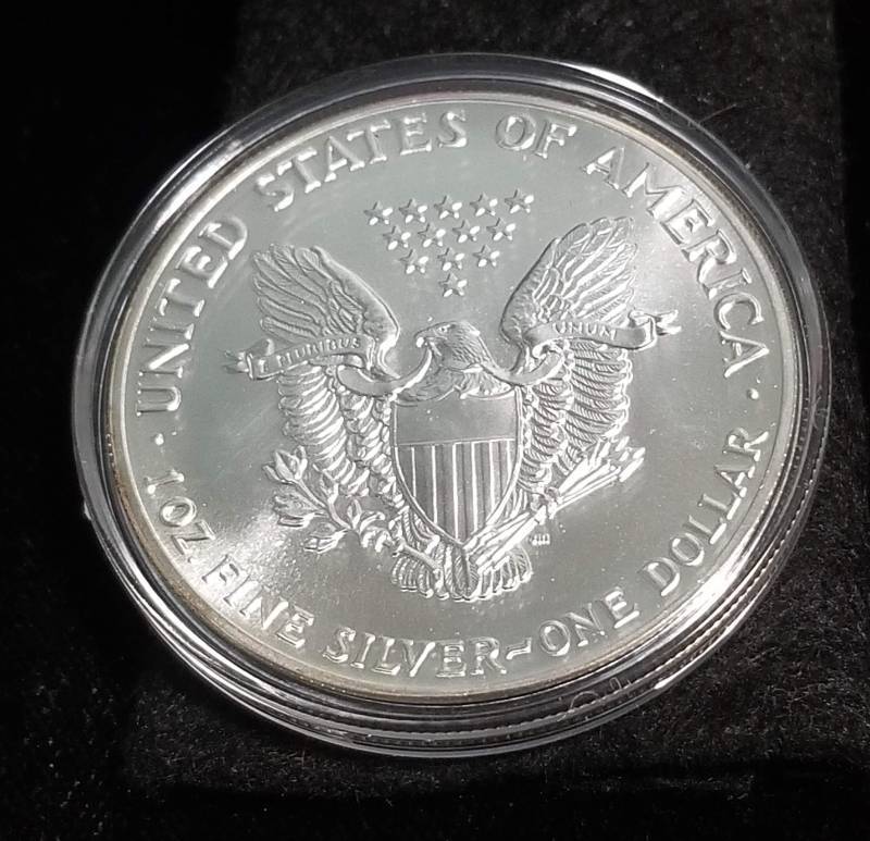 1986 AMERICAN SILVER EAGLE 1 TROY OZ. .999 FINE SILVER IN AIRTITE
