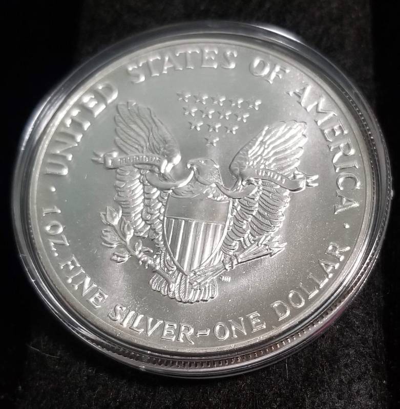 1987 AMERICAN SILVER EAGLE 1 TROY OZ. .999 FINE SILVER IN AIRTITE