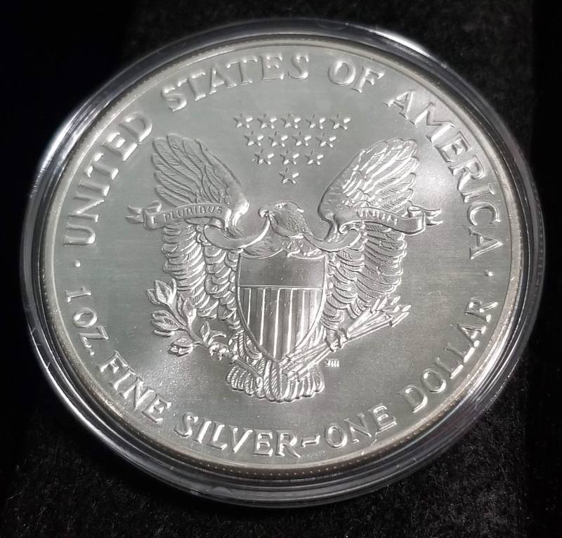 1990 AMERICAN SILVER EAGLE 1 TROY OZ. .999 FINE SILVER IN AIRTITE