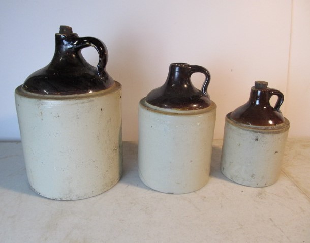 lot 21 image: Set of 3 Antique Stoneware WhiskeyWater Jugs