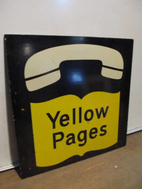 lot 102 image: Large Original Vintage YELLOW PAGES Painted Wood Telephone Advertising Sign