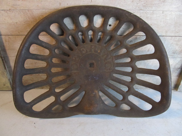 lot 36 image: Antique McCormick DEERING International Harvester Embossed Iron Tractor Seat