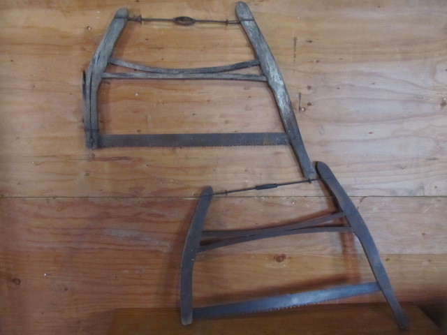 lot 116 image: Pair of Antique Buck Saws