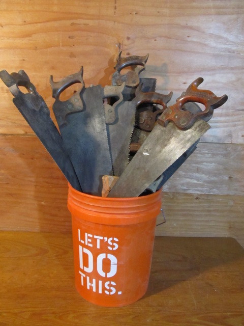 lot 382 image: Bucket FULL of Antique Hand Saws