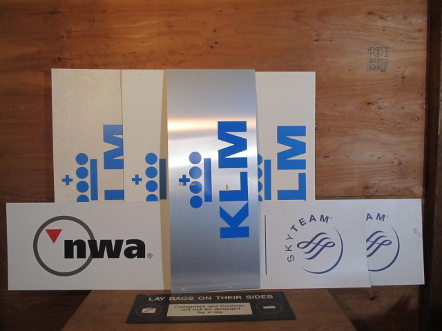lot 412 image: Lot of NORTHWEST and KLM Airlines Airport Signs