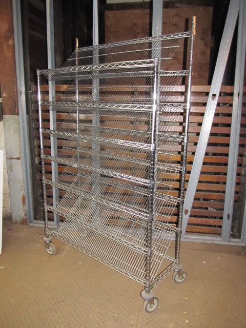 lot 373 image: Nice NSF Steel Slanted Rolling Rack Cart