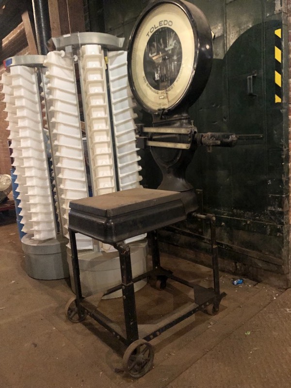 lot 480 image: Antique Toledo Platform Scale w Rolling Base & Cast Iron Wheels