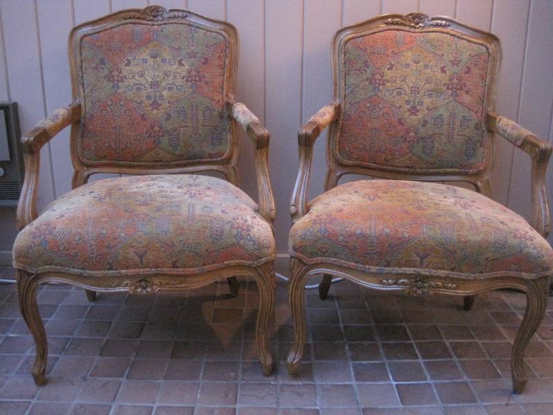 lot 19 image: A pair of French Style Upholstered Armchairs.