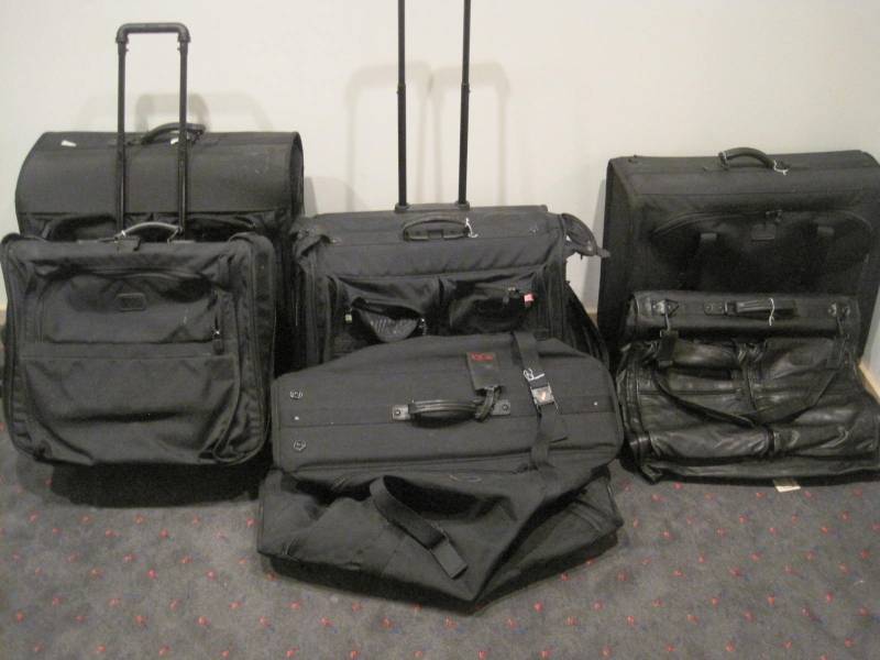 lot 42 image: Lot of 6 Tumi Suitcase Luggage etc. 5 Fabric and 1 Leather.