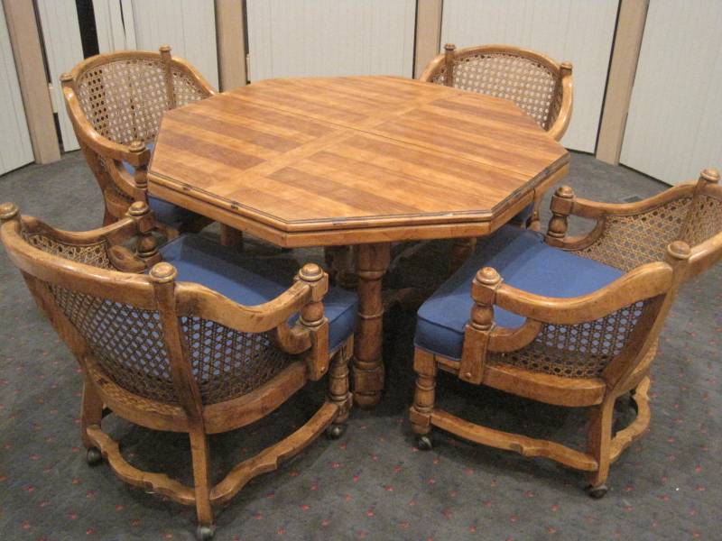 lot 43 image: Solid Wood Game Table with 4 chairs and 1 leaf.