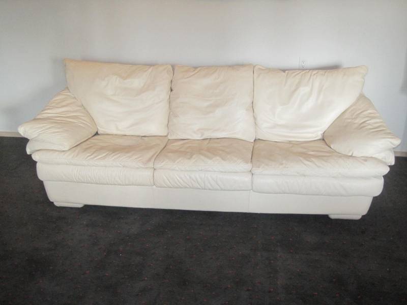 lot 54 image: White Leather & Down filled Sofa.