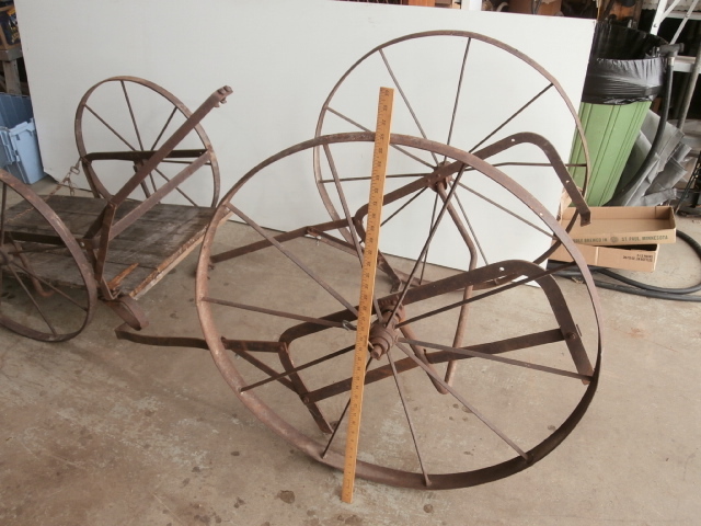 lot 93 image: Pair of Vintage Milk Can Cart Frames