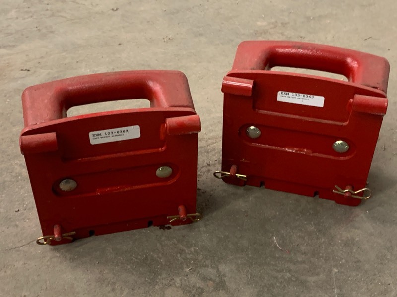 lot 7 image: (2) Exmark Lawn Mower Weights
