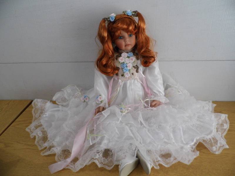 Doll in White Dress