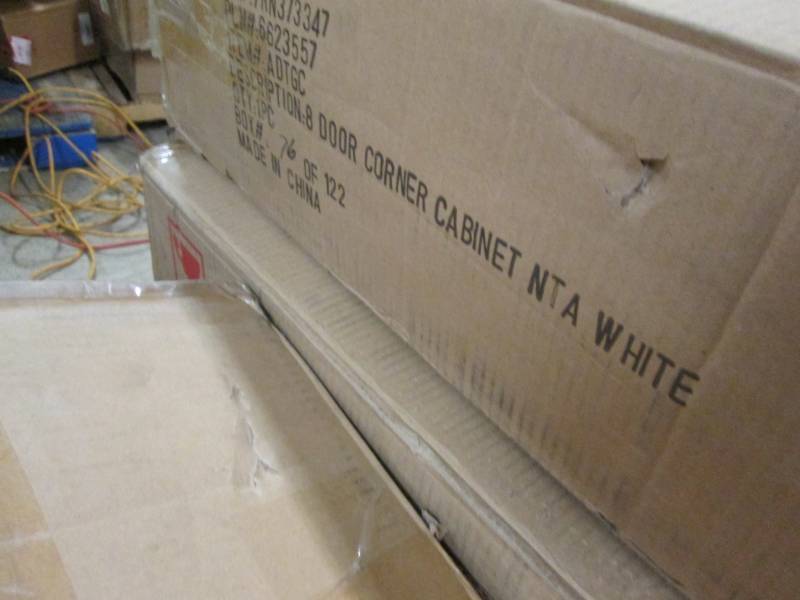 lot 96 image: 8 Door Corner Cabinet open box Reta...
