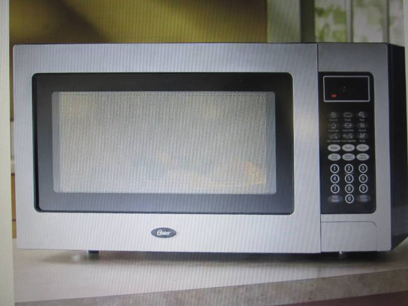 lot 110 image: Stainless Steel 1.1 Cu. Ft. Microwa...