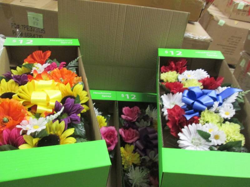 lot 229 image: Box of 4 Headstone Sprays Retail $1...