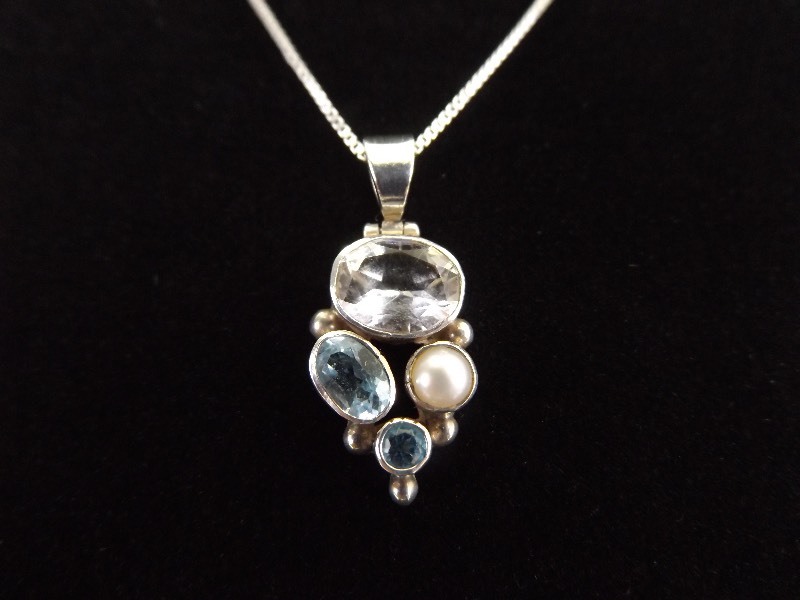 lot 8 image: .925 Sterling Silver Faceted Topaz, White Sapphire and Pearl Pendant Necklace