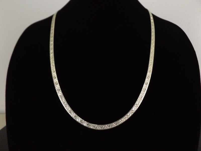 lot 21 image: .925 Sterling Silver Wide, Heavy, and Long Etched Herringbone Necklace