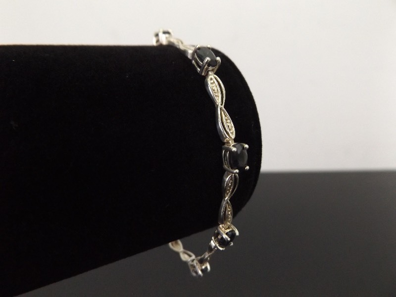 lot 31 image: .925 Sterling Silver Diamond Accented Black Sapphire Bracelet