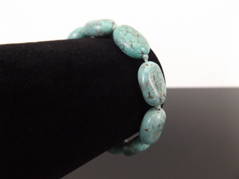 lot 34 image: .925 Sterling Silver Turquoise Semi Polished Cabochon Bracelet