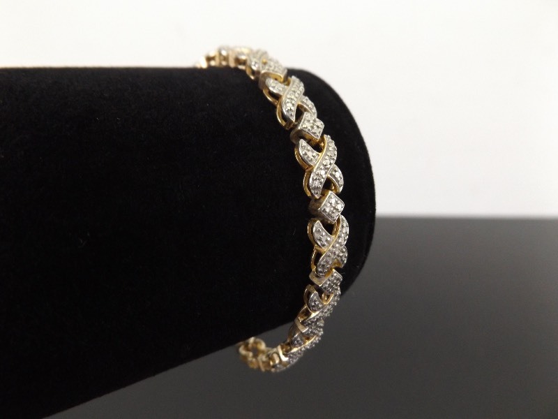lot 35 image: .925 Sterling Silver diamond Accented Vermeil Bracelet